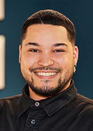 Ashton Holmes interior workplace designer headshot