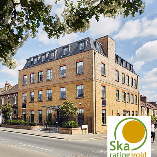 Modern brick building (Sterling House) on a sunny day with a