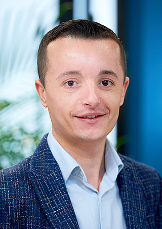 Head shot of Alexandru Oancea Project Delivery Manager at Peldon Rose