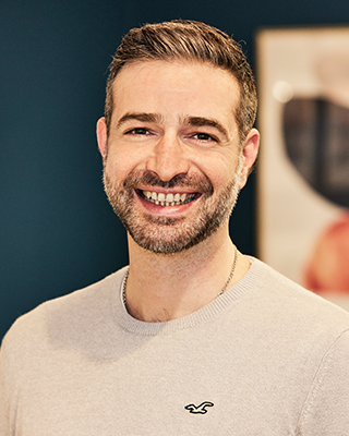Head shot of Aris Andrianopoulos business development analyst at Peldon Rose